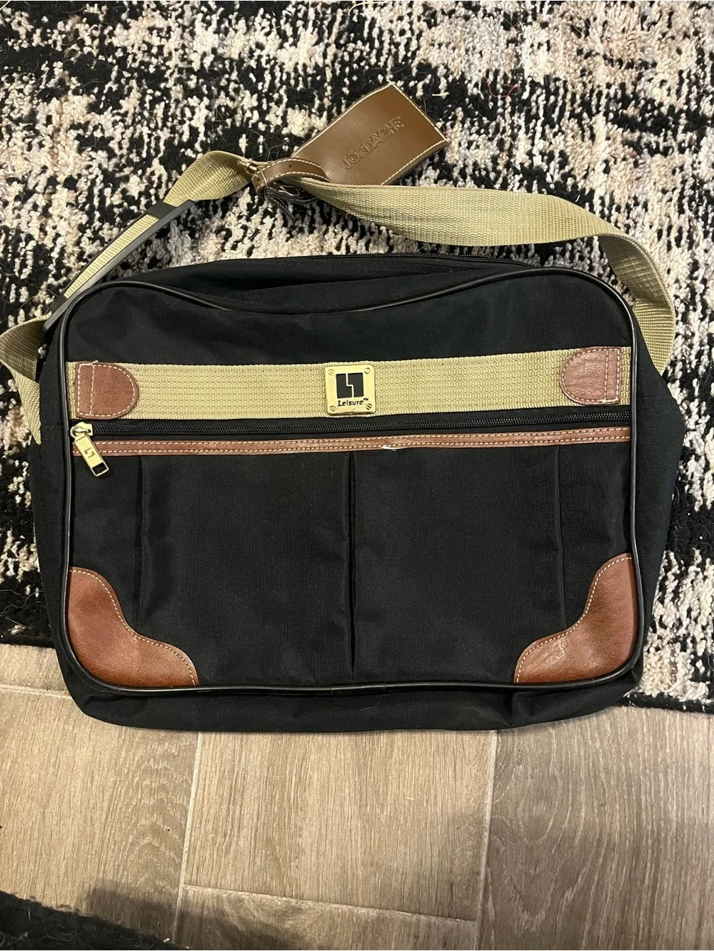 Leisure Traveler Black Canvas Messenger Bag with Brown Accents